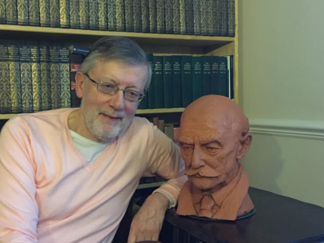 Mike Nixon with a bust of Hardy created by the artist Vivien Geddes